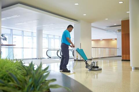 man polishing floors
