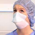 Healthcare worker looking at ceiling