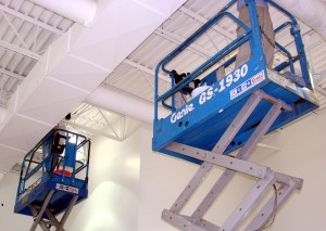 Two machine lifts in a warehouse during ServiceMaster Clean’s post construction cleaning services in St. Cloud, Minnesota