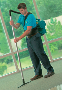man vacuuming commercial space